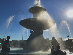 A fountain in the middle of the Place de la Concorde.